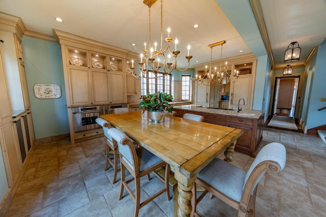304 Braebourne Ct, Green Bay, WI 54301 - dining area with an inviting chandelier, ornamental molding, and sink