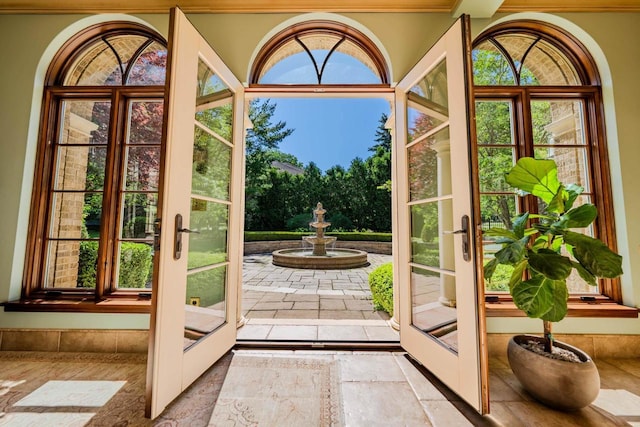 entryway featuring french doors