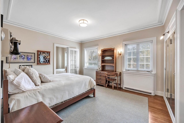 304 Braebourne Ct, Green Bay, WI 54301 - bedroom with hardwood / wood-style floors and ornamental molding