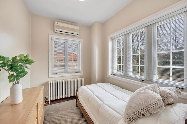 304 Braebourne Ct, Green Bay, WI 54301 - bedroom with an AC wall unit and radiator