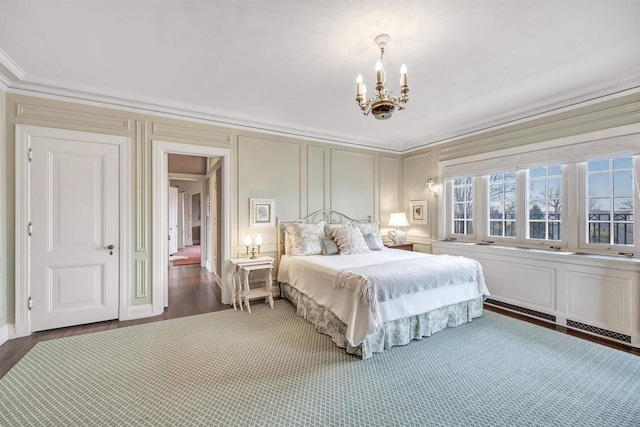 304 Braebourne Ct, Green Bay, WI 54301 - bedroom featuring a notable chandelier, dark hardwood / wood-style flooring, and crown molding