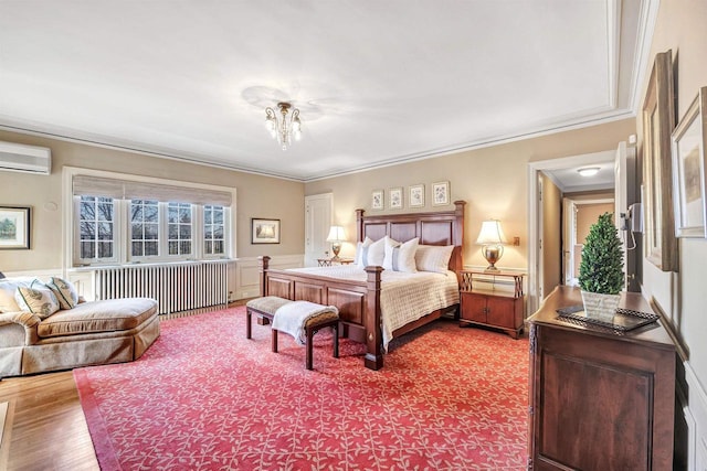 304 Braebourne Ct, Green Bay, WI 54301 - bedroom with radiator heating unit, a notable chandelier, a wall mounted AC, wood-type flooring, and ornamental molding