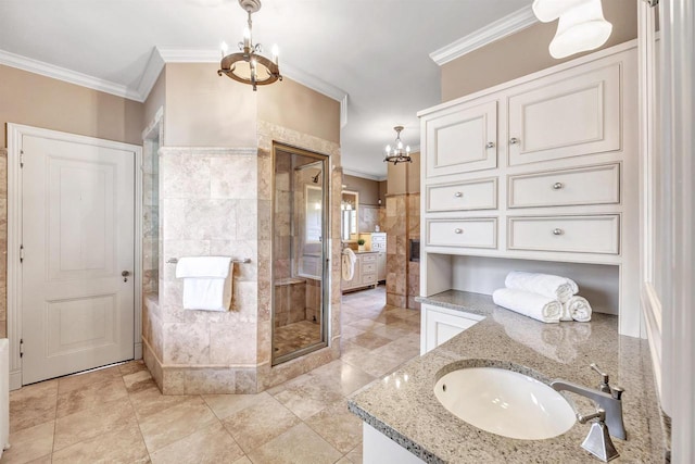 304 Braebourne Ct, Green Bay, WI 54301 - bathroom featuring vanity, ornamental molding, tile walls, and an inviting chandelier