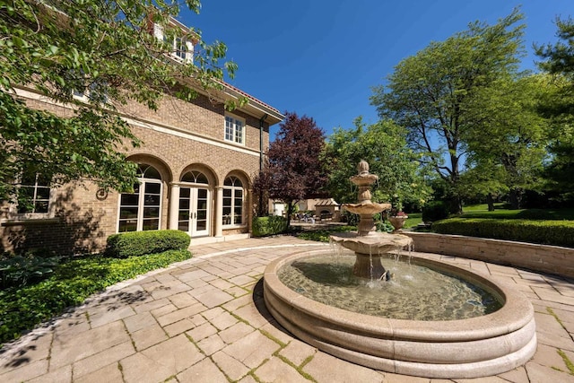 304 Braebourne Ct, Green Bay, WI 54301 - view of patio with french doors