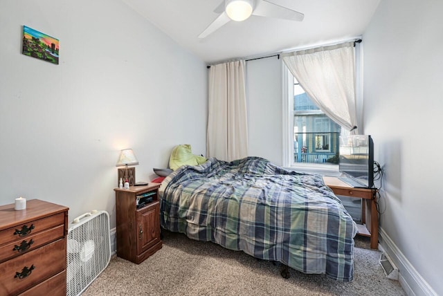 carpeted bedroom featuring ceiling fan