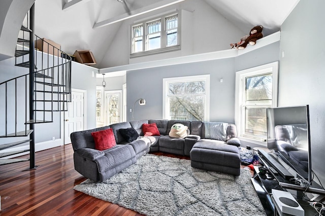 living room featuring beamed ceiling, high vaulted ceiling, and dark hardwood / wood-style floors