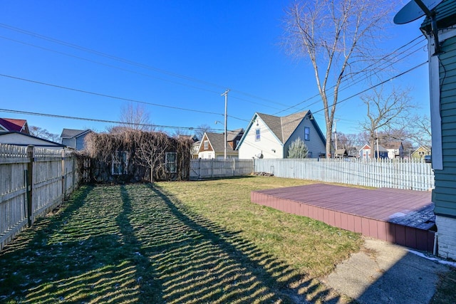 view of yard with a wooden deck