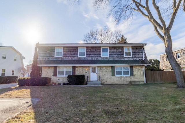 view of front of property with a front lawn