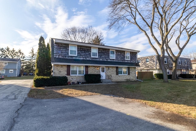 view of front of property with a front lawn