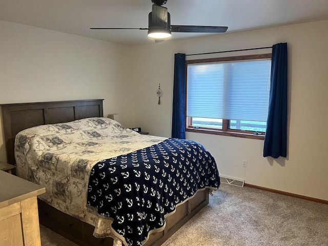 carpeted bedroom featuring ceiling fan