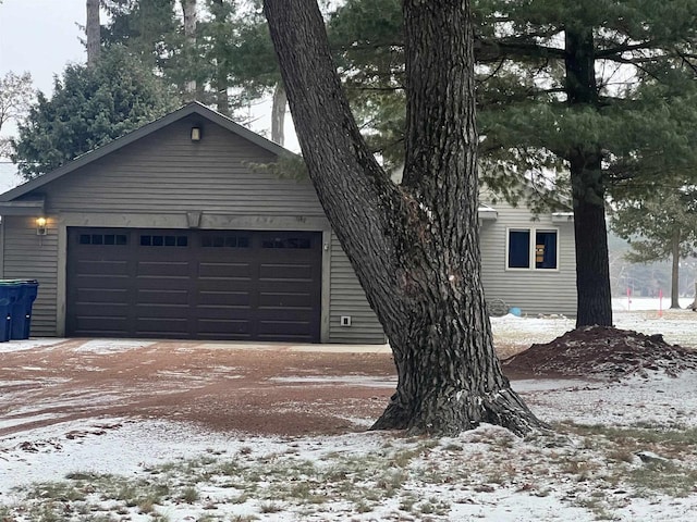 exterior space featuring a garage