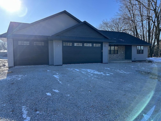 view of front of property featuring a garage