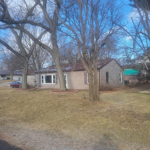 exterior space featuring a lawn