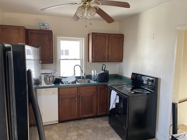 kitchen featuring black appliances, ceiling fan, and sink