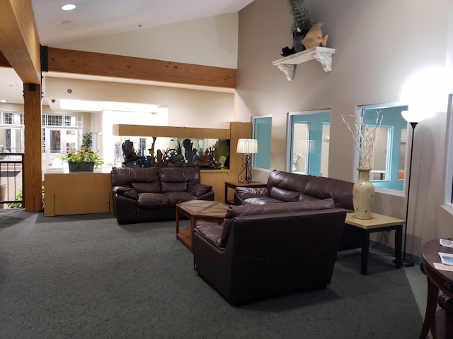 carpeted living room featuring high vaulted ceiling