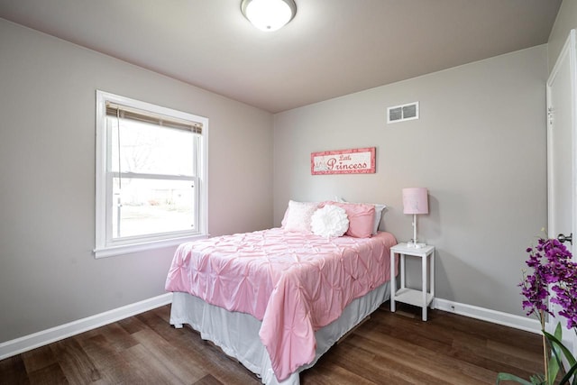 bedroom featuring dark wood-type flooring