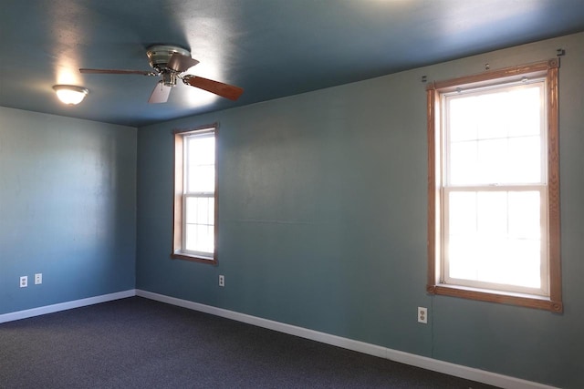 spare room featuring ceiling fan