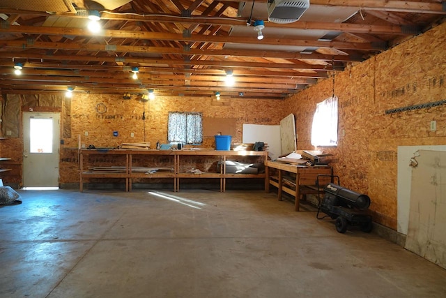 interior space featuring a workshop area and plenty of natural light