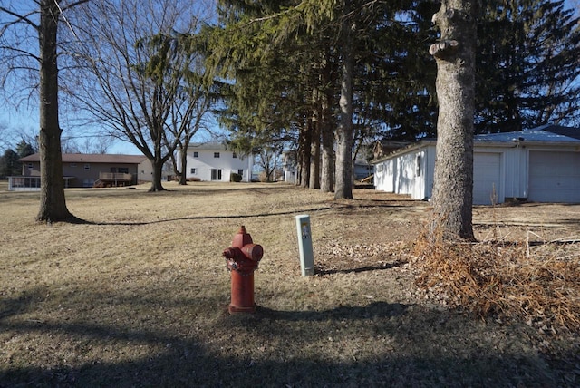 view of yard with a garage