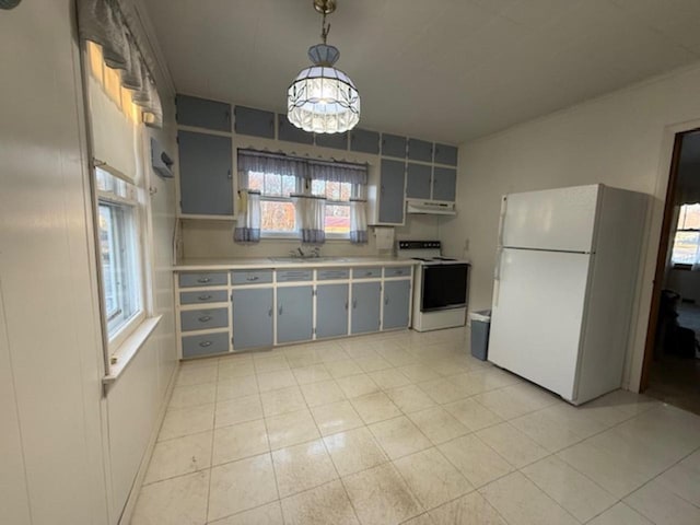 kitchen featuring gray cabinetry, decorative light fixtures, white appliances, and sink