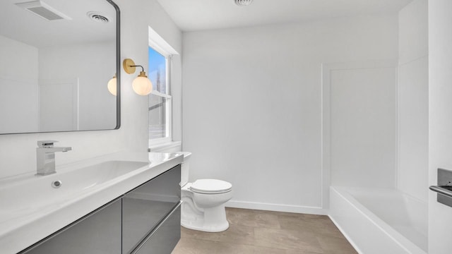 bathroom with toilet and sink