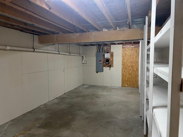 basement featuring electric panel