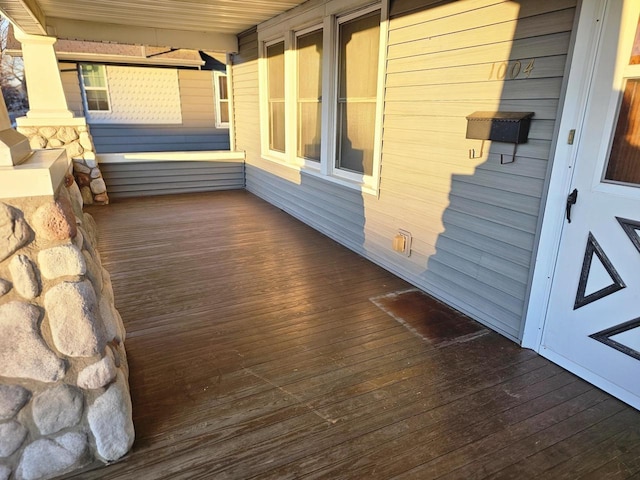 wooden deck featuring covered porch