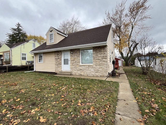 view of front of home with a front lawn