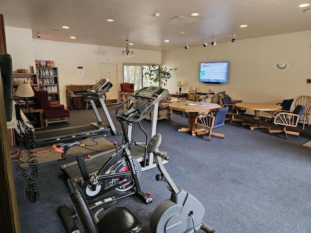 workout area with track lighting