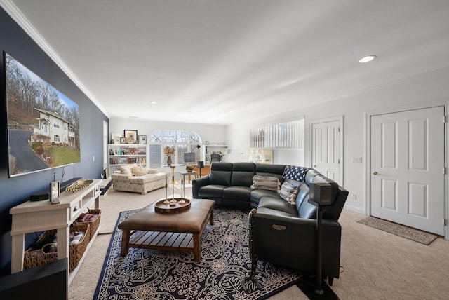 living room with crown molding and light carpet