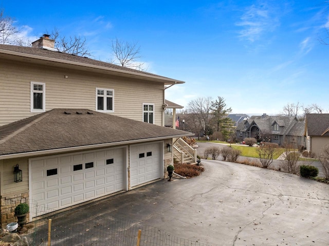 view of home's exterior featuring a garage