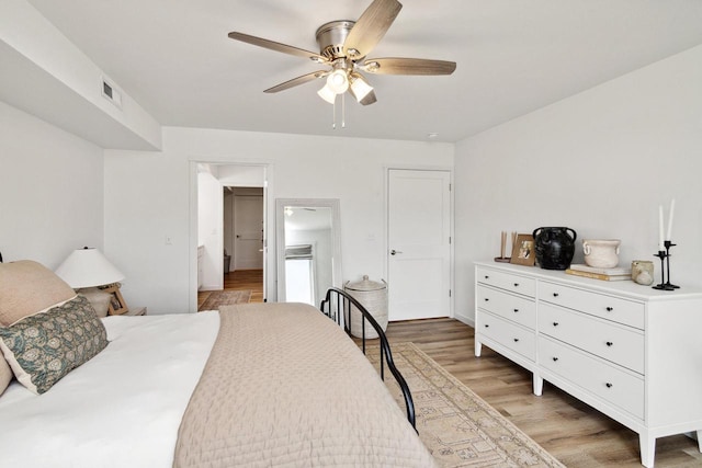 bedroom featuring ceiling fan and light wood-type flooring