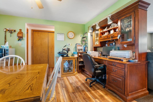 office featuring ceiling fan and light hardwood / wood-style floors