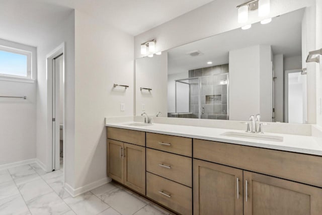 bathroom featuring vanity and an enclosed shower