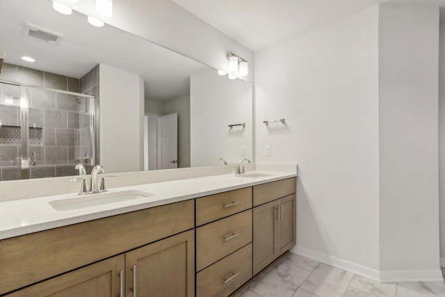 bathroom with vanity and walk in shower