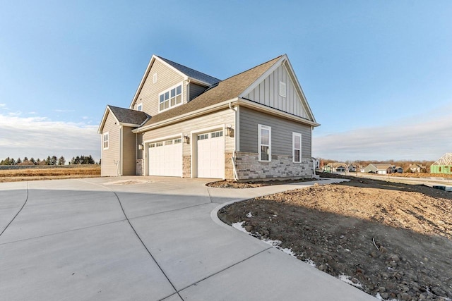 view of property exterior featuring a garage