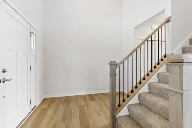 entrance foyer with light hardwood / wood-style floors