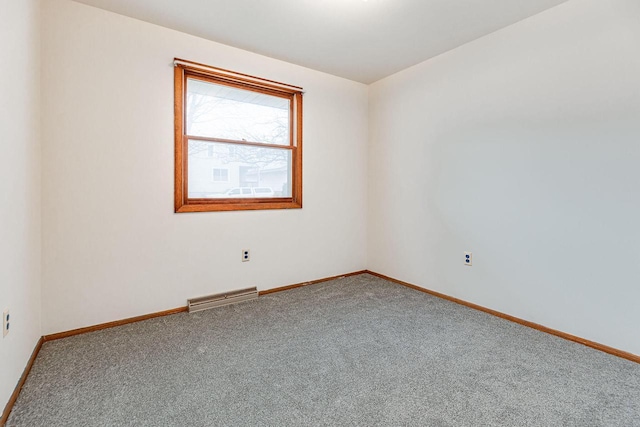 unfurnished room with carpet