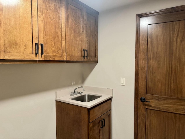 laundry room featuring sink