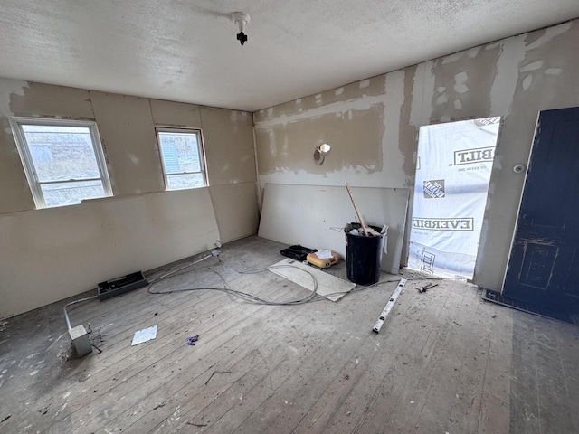 spare room featuring a textured ceiling