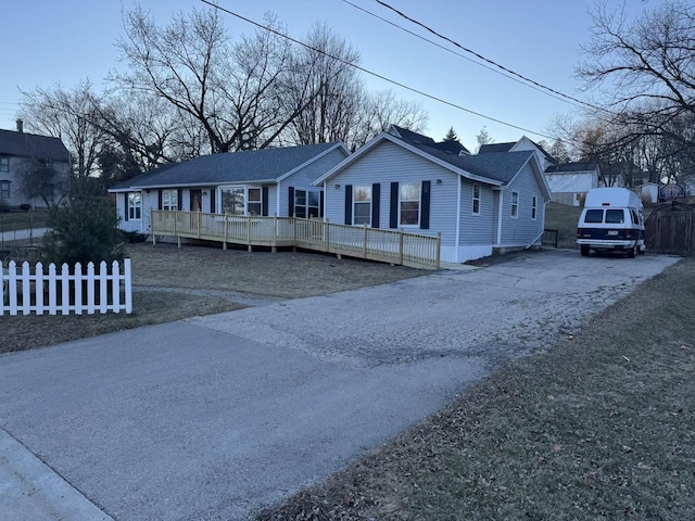 view of front of home with a wooden deck