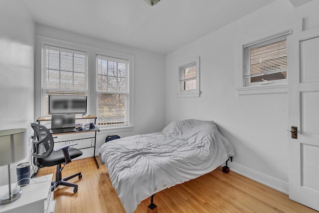 bedroom with light hardwood / wood-style flooring