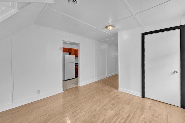 unfurnished room featuring light hardwood / wood-style floors