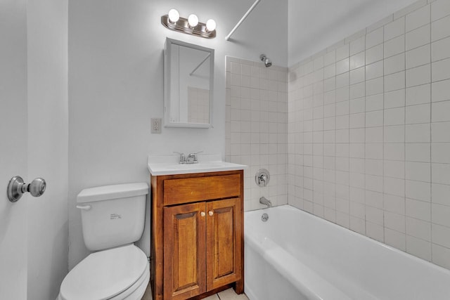 full bathroom with vanity, toilet, and tiled shower / bath