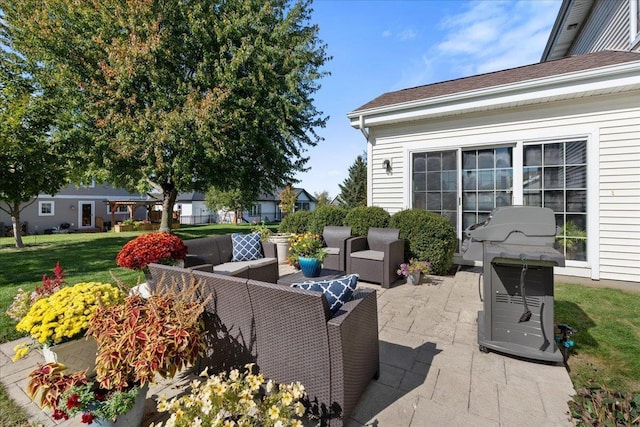 view of patio / terrace with grilling area and an outdoor living space