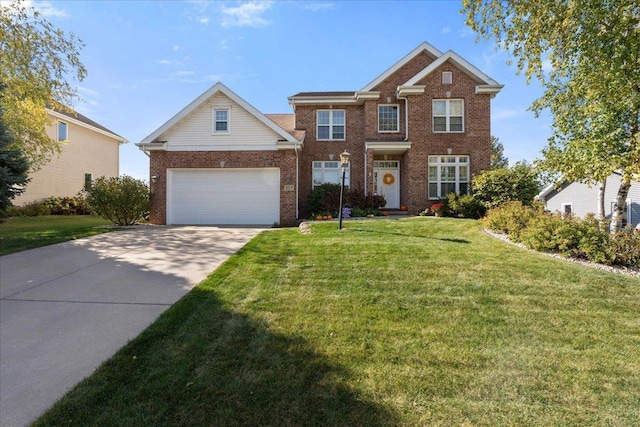 view of front of home with a front lawn and a garage