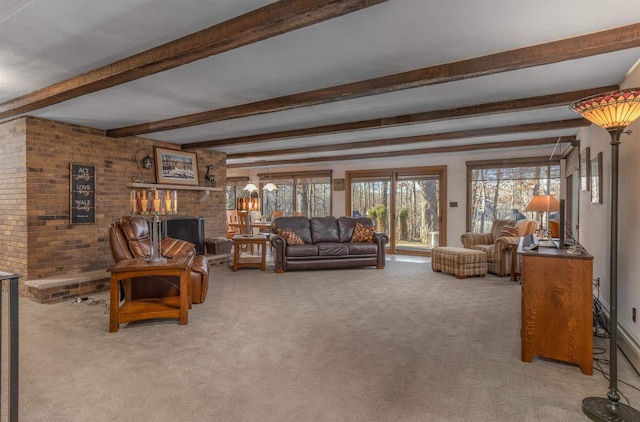 carpeted living room featuring beam ceiling and a brick fireplace