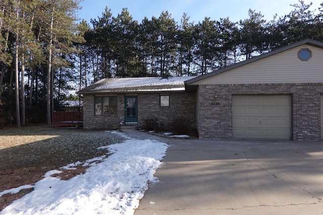 single story home with a garage