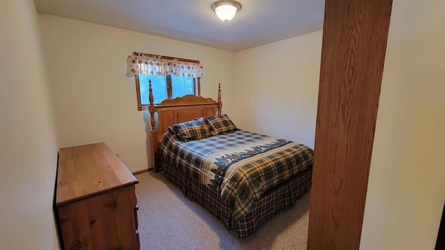 bedroom featuring carpet