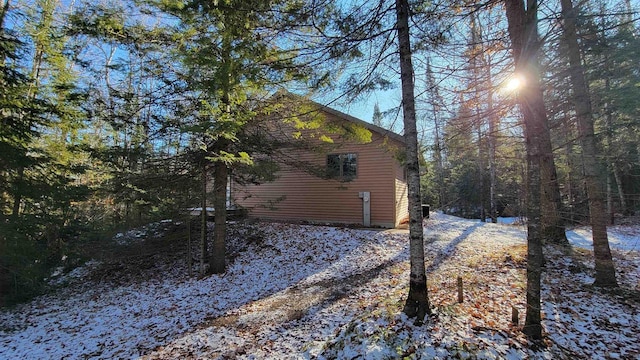 view of snow covered property